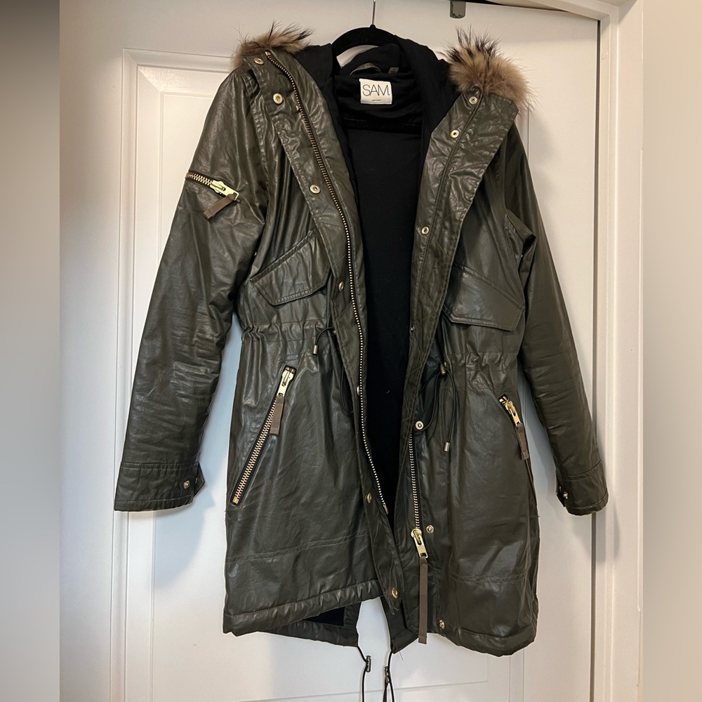 SAM. Green parka